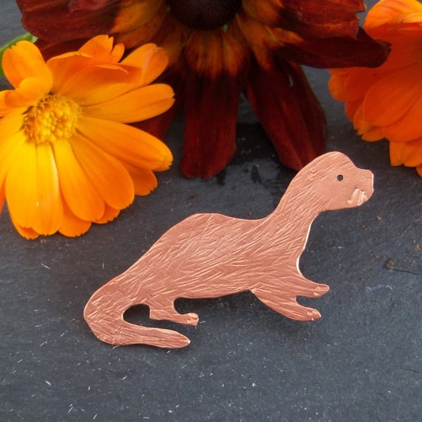 Otter brooch in copper with sterling silver fastener