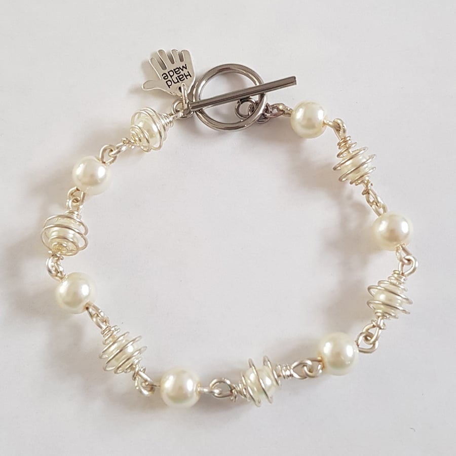Image of White Pearl Wire Wrapped Bracelet with Silver Tone Caged Beads