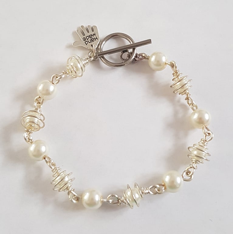 White Pearl Wire Wrapped Bracelet with Silver Tone Caged Beads