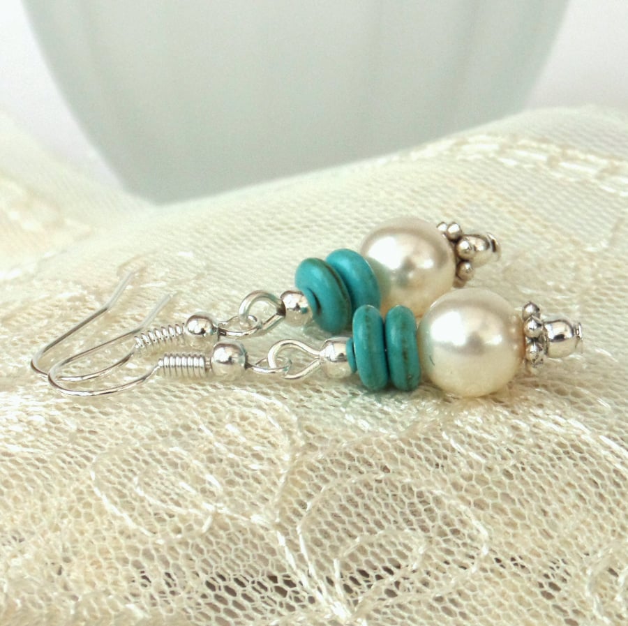 Swarovski® pearl earrings with turquoise howlite rings