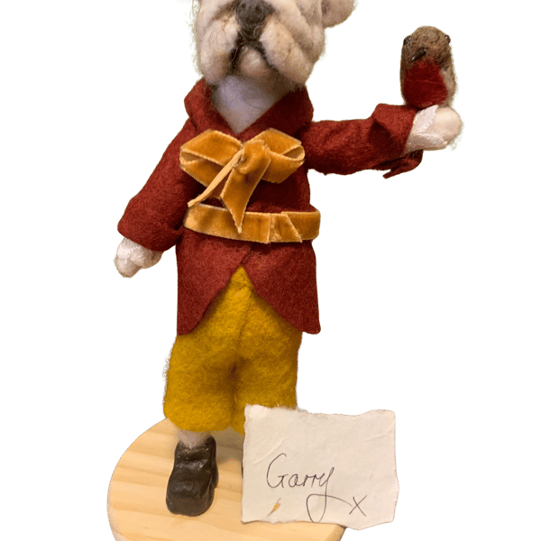 Meet Garry, a dapper bulldog in a russet wool coat and Bob the Robin