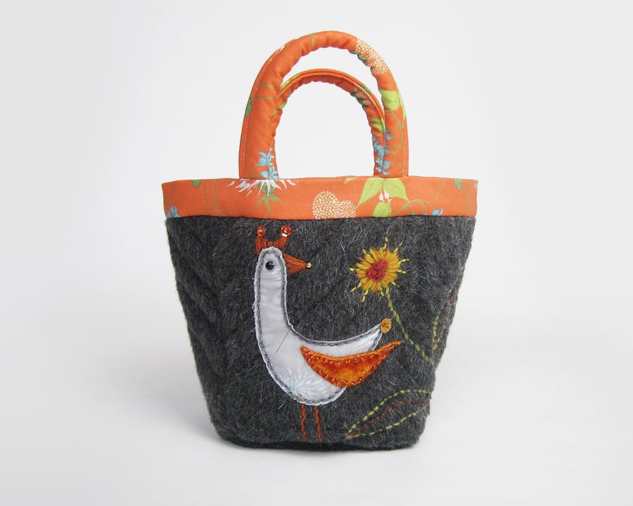 Charcoal mohair bijou project bag with bird appliqué and marigold embroidery