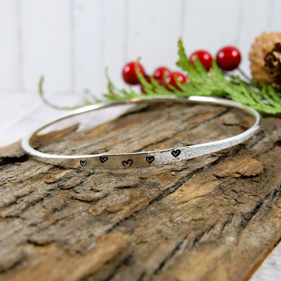 Sterling Silver Bangle with Stamped Hearts. Fits Size Medium 20cm 