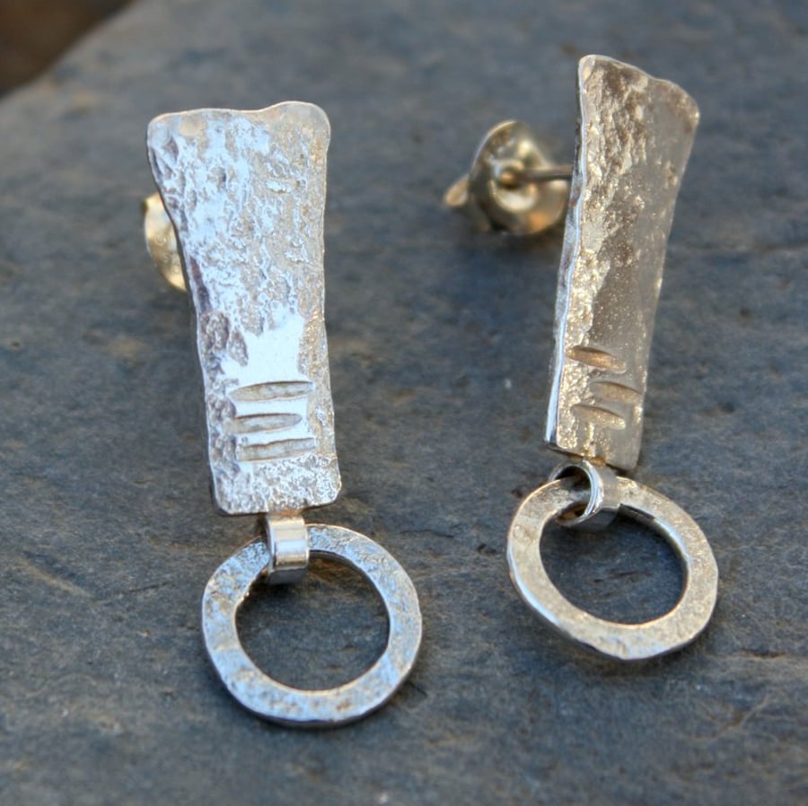 silver earrings tribal studs