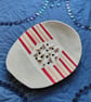 Ceramic soap dish with pastel red and peach stripes - Image 1