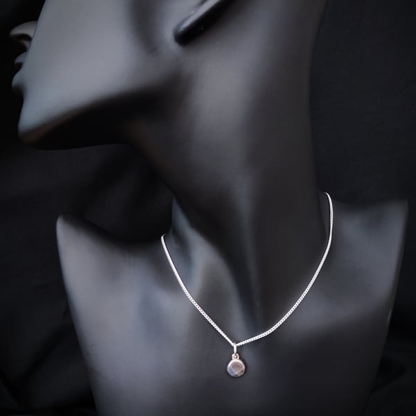 Small silver dot pendant