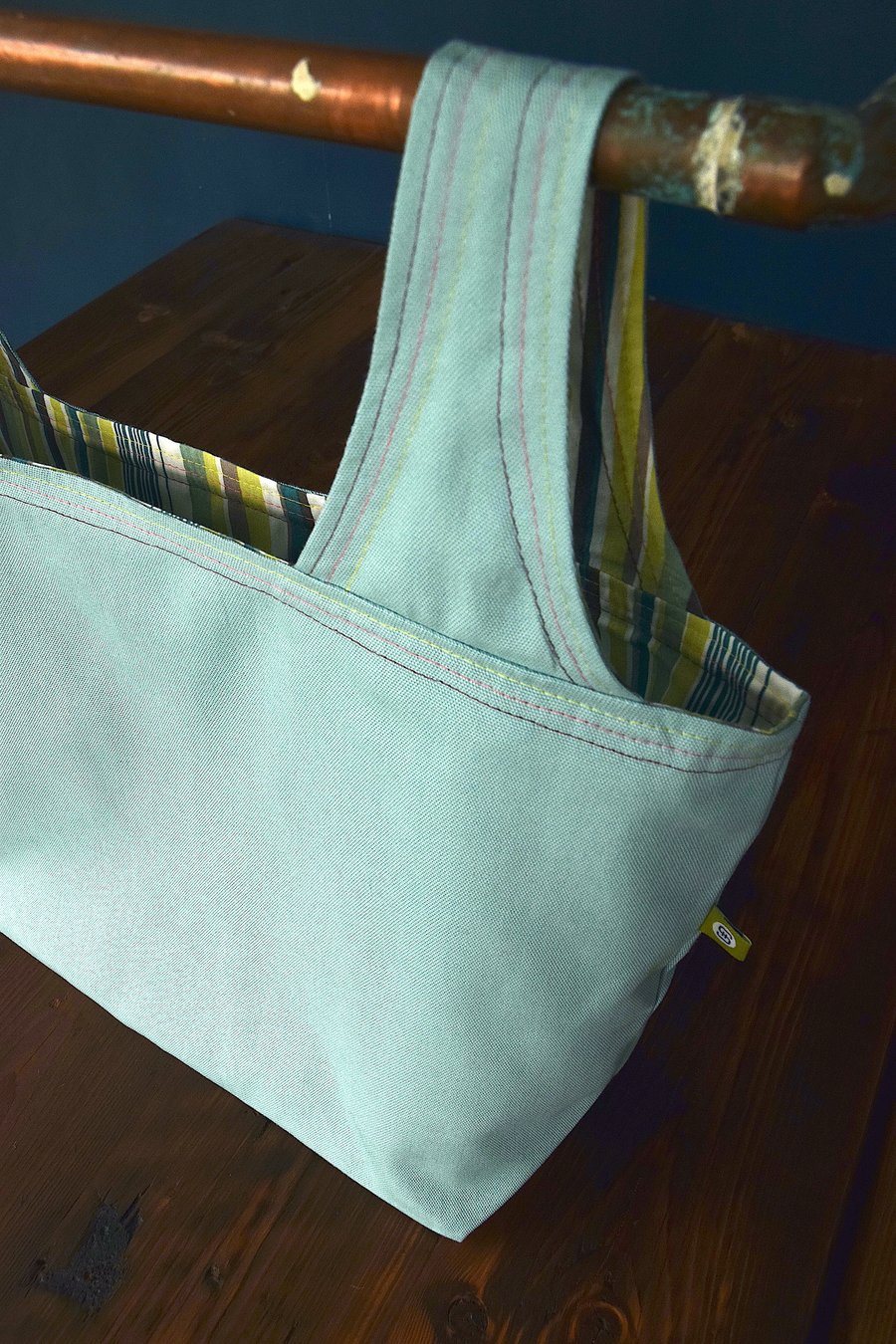 shopping bag – pale blue with stripey interior in greens