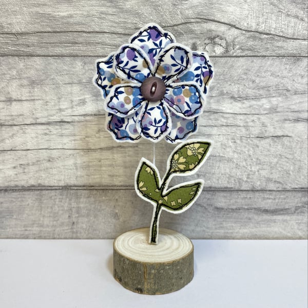 Flower and Leaf on a Wire Stem in a Wooden Stand