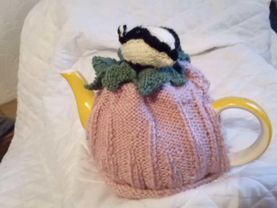 A badger on a tea cosy. 