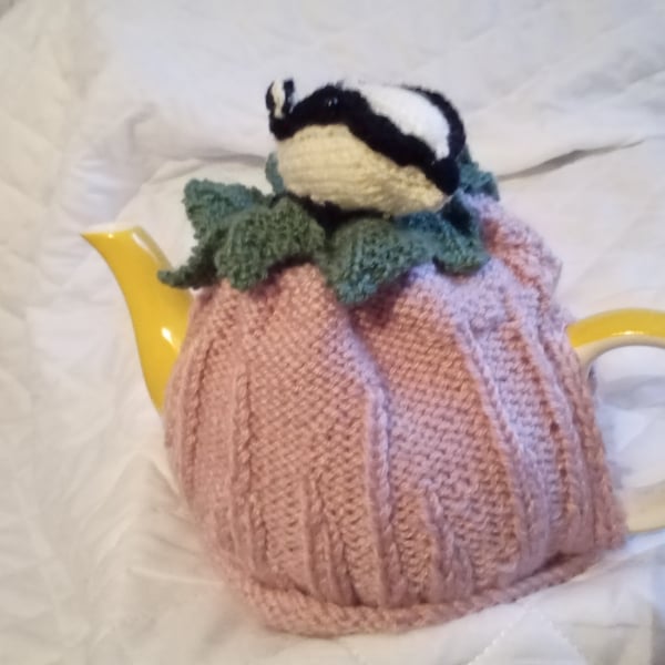 A badger on a tea cosy. 