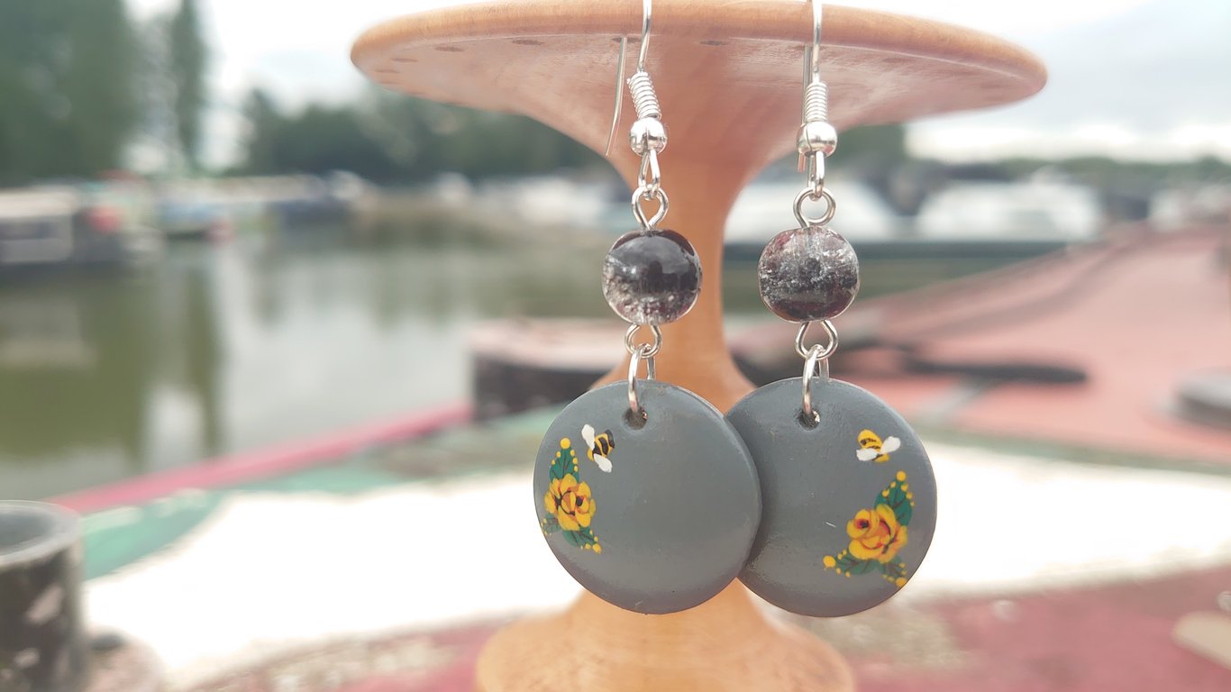Rose and castle handpainted earrings, lunar pattern 