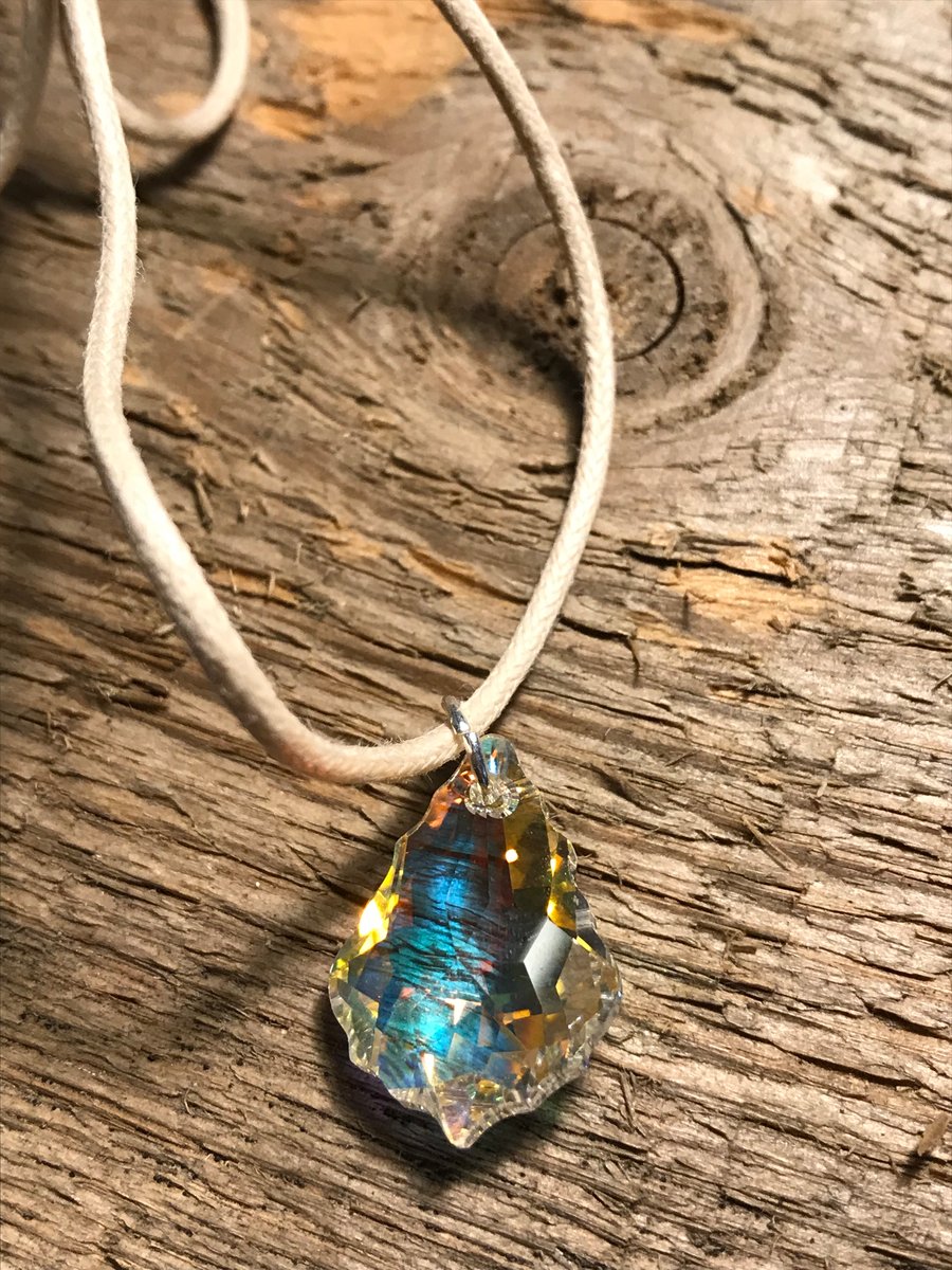 Swarovski crystal pendant on light sand cord