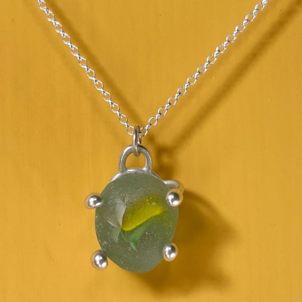 beach found marble pendant in organic silver setting