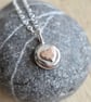 Sterling silver pebble pendant with bronze heart, Small silver nugget necklace