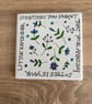 Ceramic coaster with hand drawn design and quote