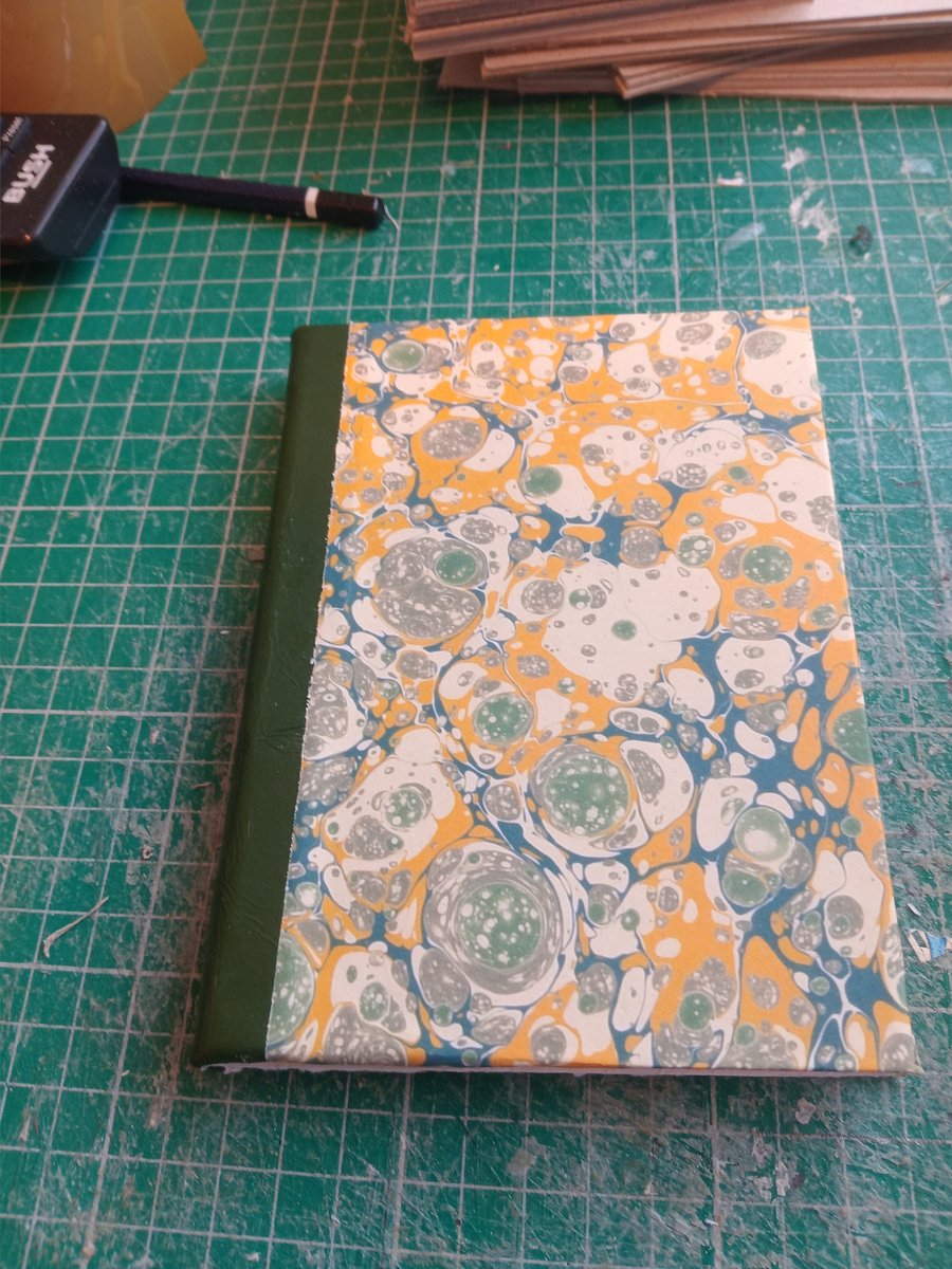 A6 Notebook with printed marbled cover and drawing paper imperfectly made 