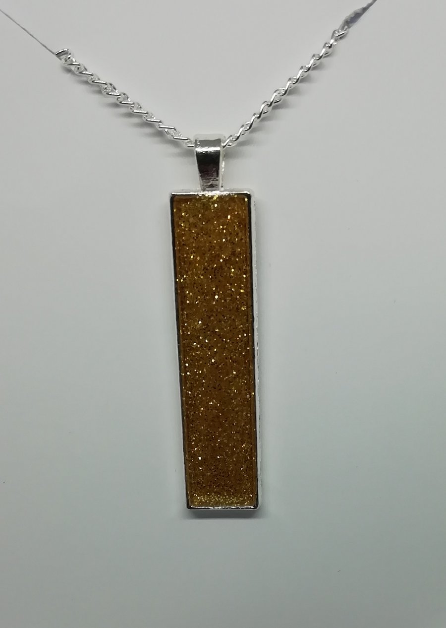 Rectangular glittered epoxy pendant