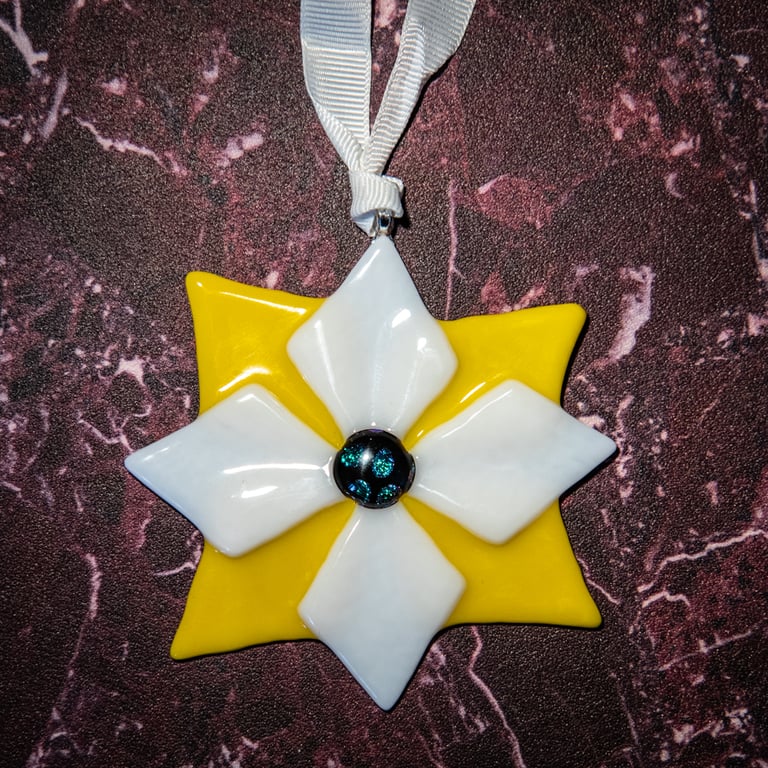 Star shaped light catcher in solid white and yellow fused glass