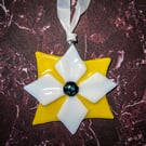 Star shaped light catcher in solid white and yellow fused glass