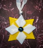 Star shaped light catcher in solid white and yellow fused glass