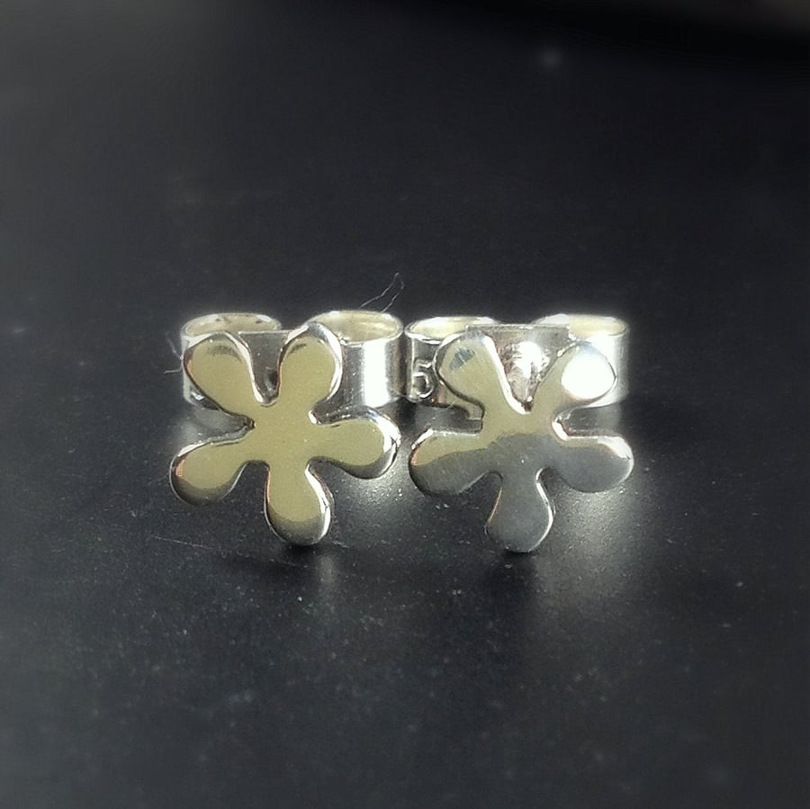 Tiny sterling silver flower stud earrings