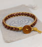Goldstone and metallic gold leather bracelet with wooden button fastener  - Image 9
