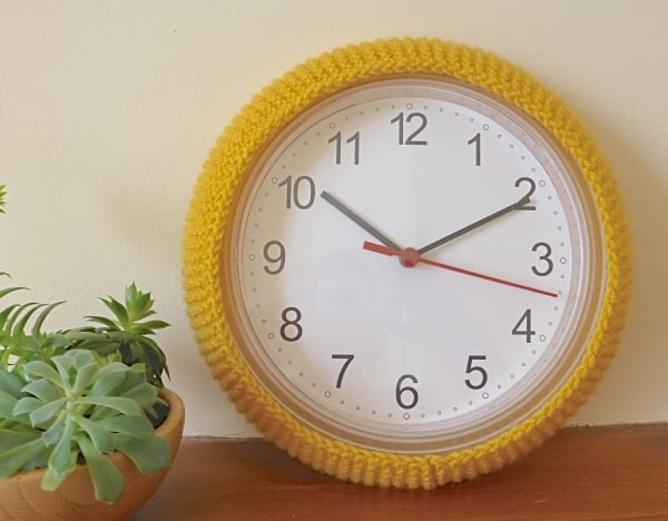 Wall clock cover, cosy for wall clock, yellow knitted clock cozy