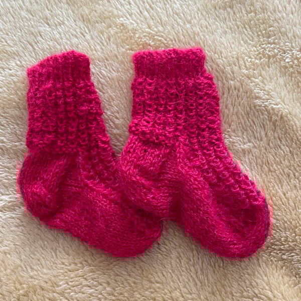 Red socks for a young baby