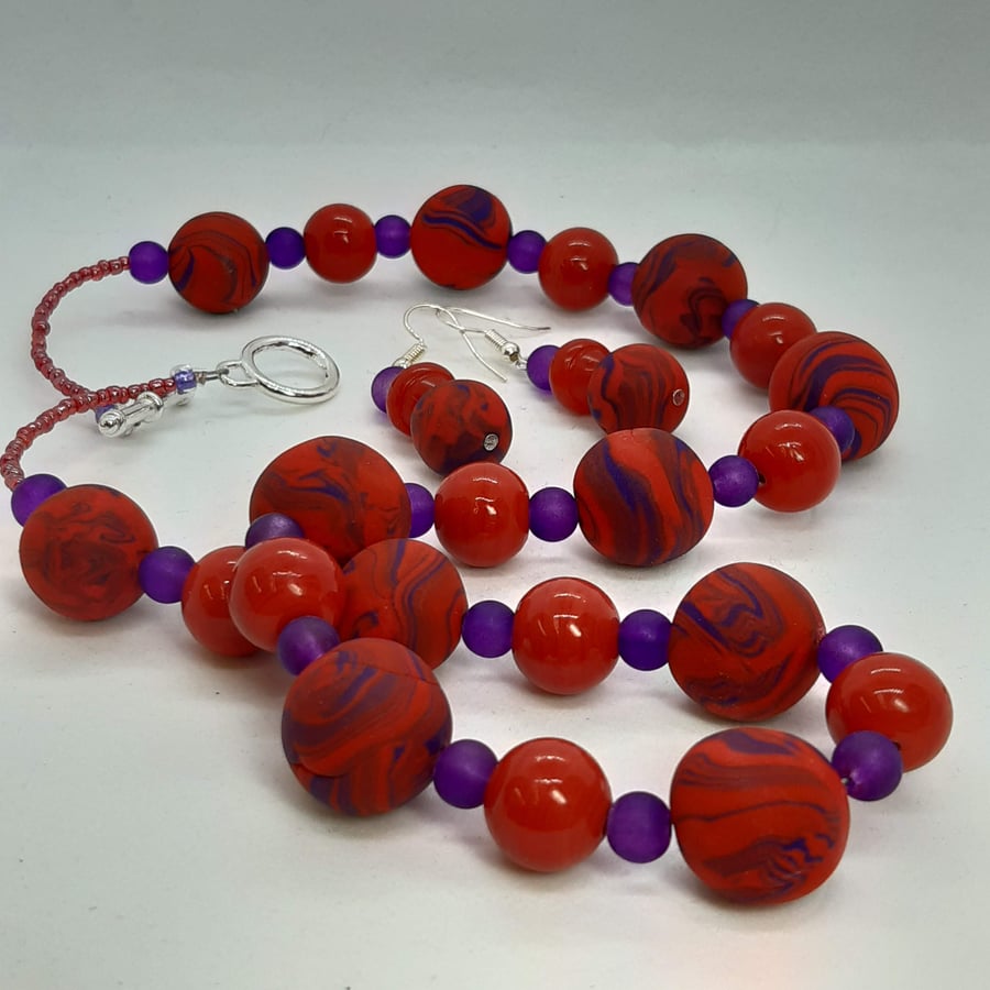 Red and purple necklace and earrings set