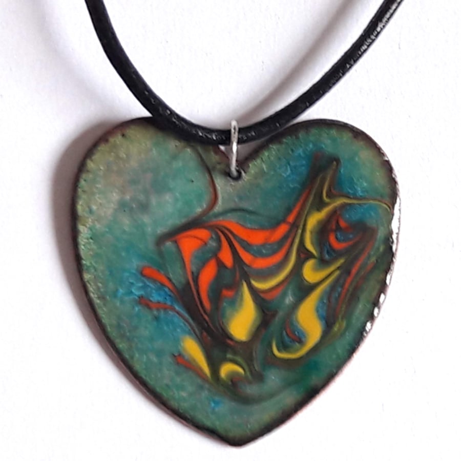 large heart pendant on thong - red and yellow scrolled over green enamel