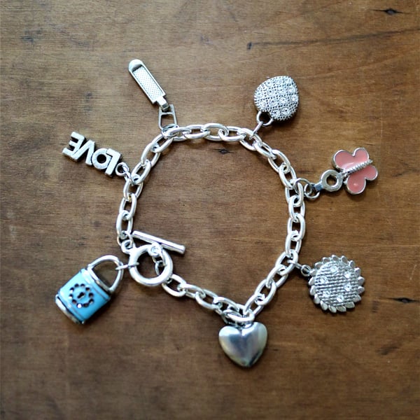 Up-cycled Vintage Heart and butterfly - LOVE and blue lock charms bracelet
