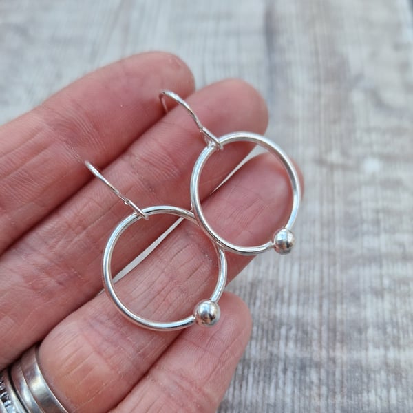 Sterling Silver Circle Hoop Earrings with Small Pebble Details