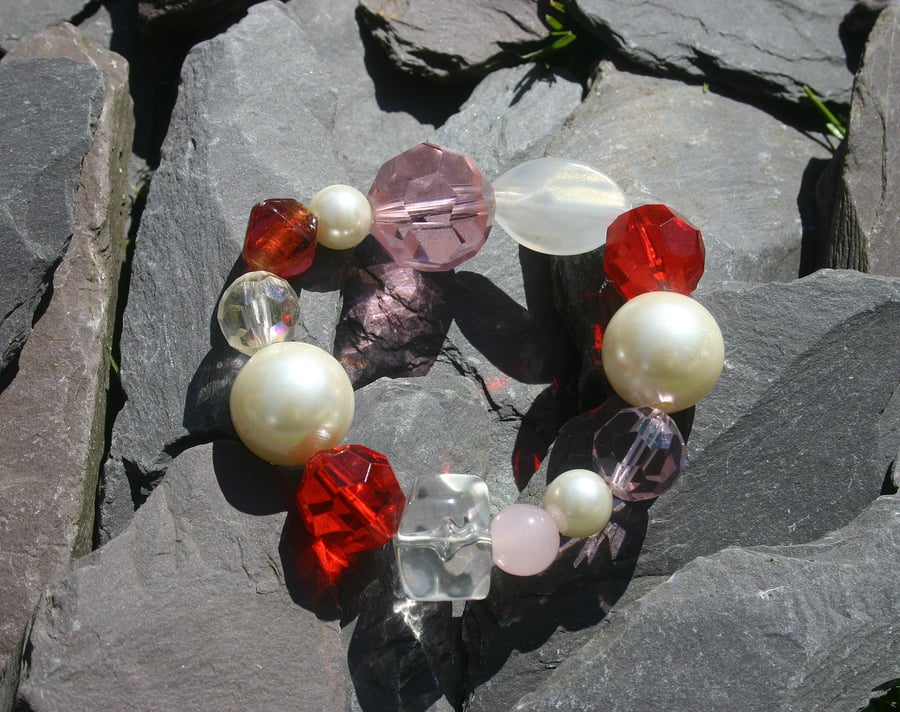 Sale item. 50% off pink, white and red beaded bracelet