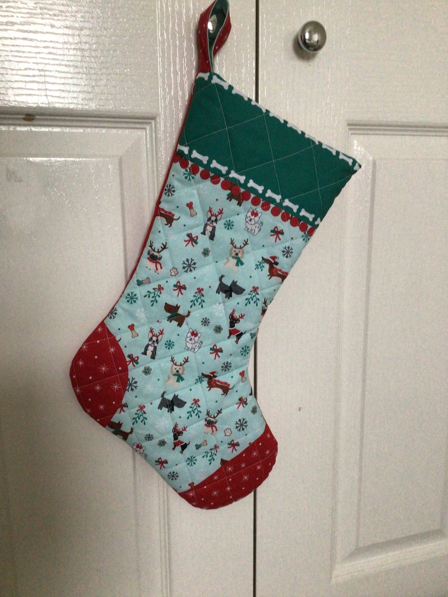 Quilted Christmas stocking, dogs,turquoise.