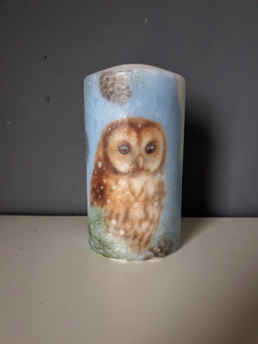 owl decorated candle