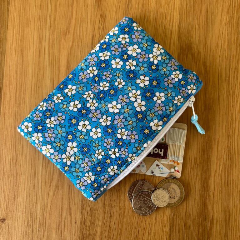 Small zipped fabric coin purse, pouch, in blue and white floral pattern