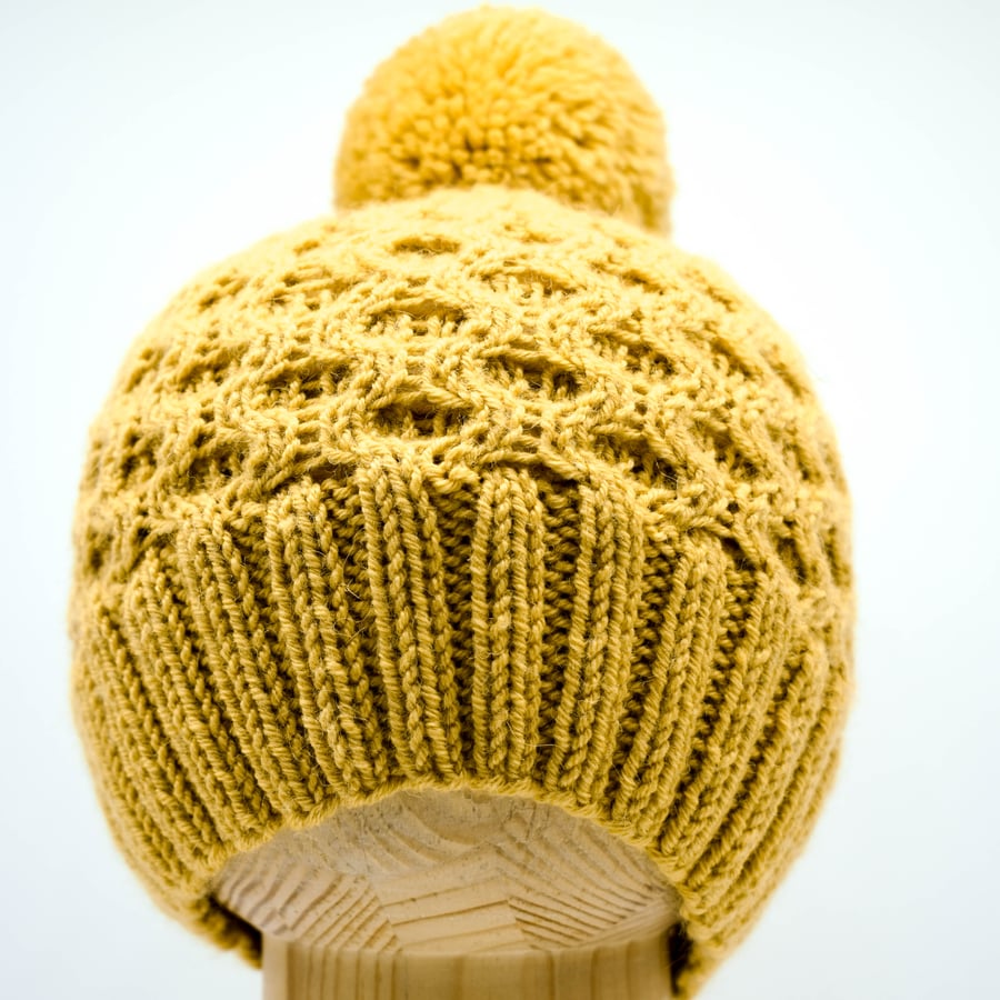 Hand Knitted "Honeycomb" pom-pom hat in ochre yellow 6-12 months