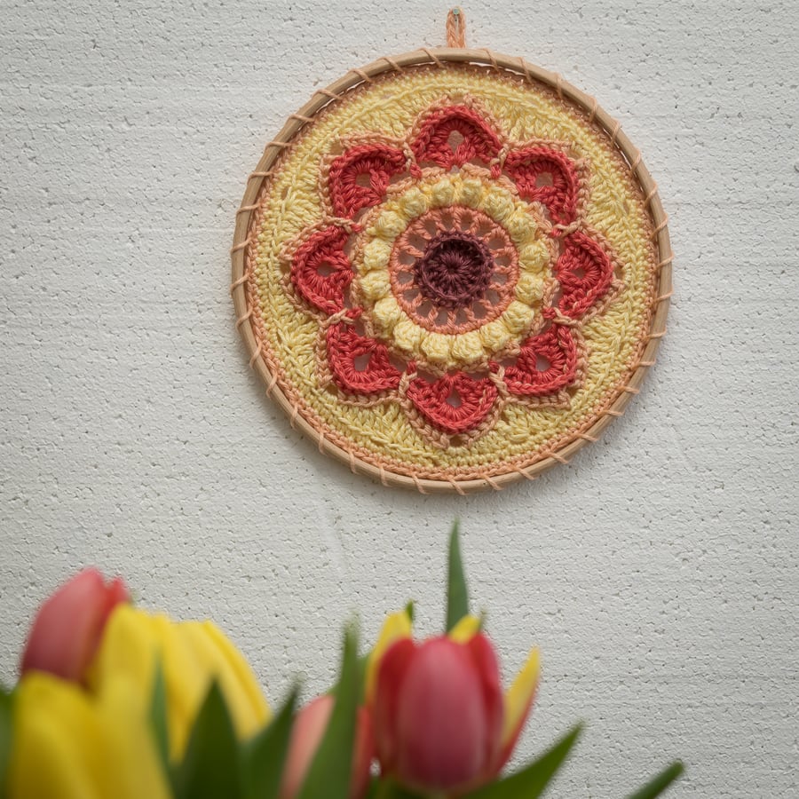 Yellow and orange crochet mandala wall hanging