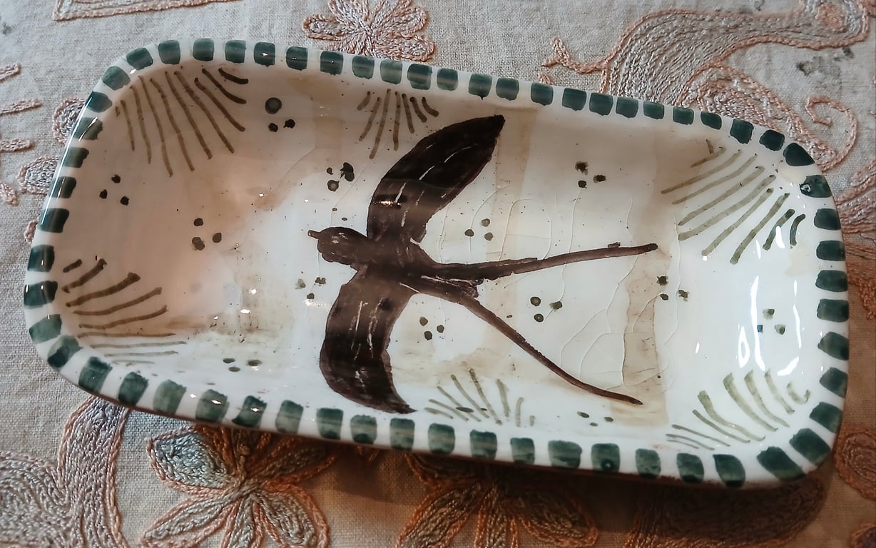 Square slip ware dish with hand painted swift design