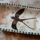 Square slip ware dish with hand painted swift design