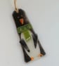 Festive penguin tree decoration, fused glass Christmas hanger, seasonal decor. 