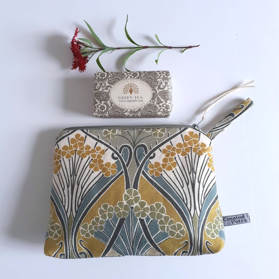 Make up bag recycled from a designer remnant in an autumnal Art Nouveau style