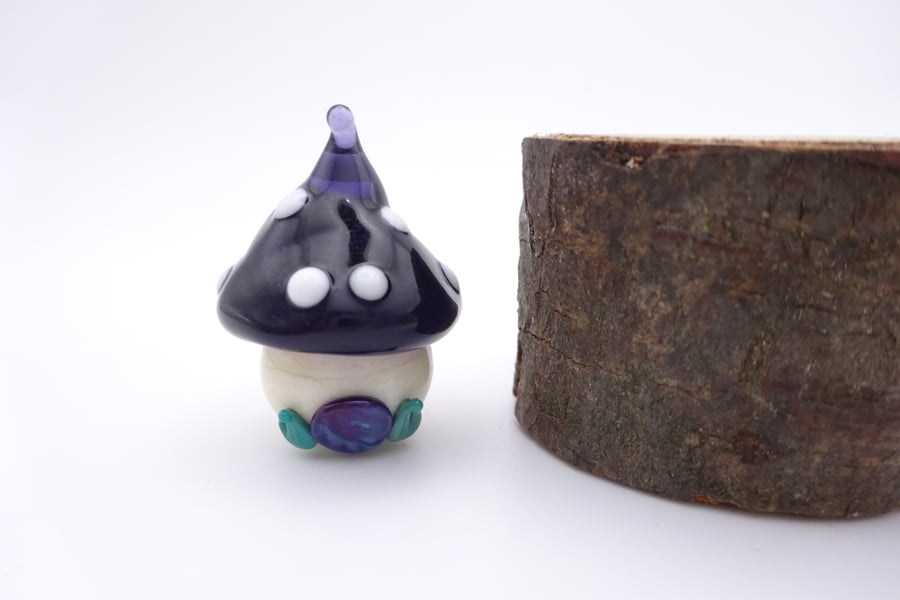 small glass toadstool house