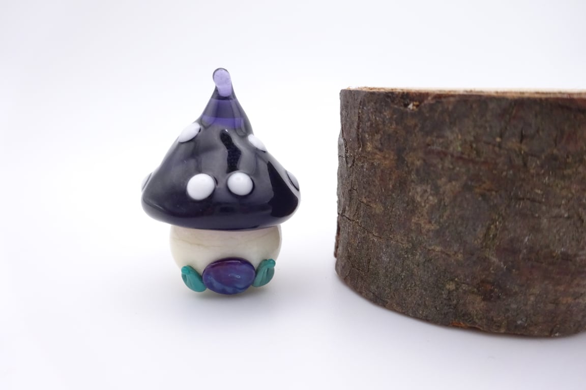 small glass toadstool house