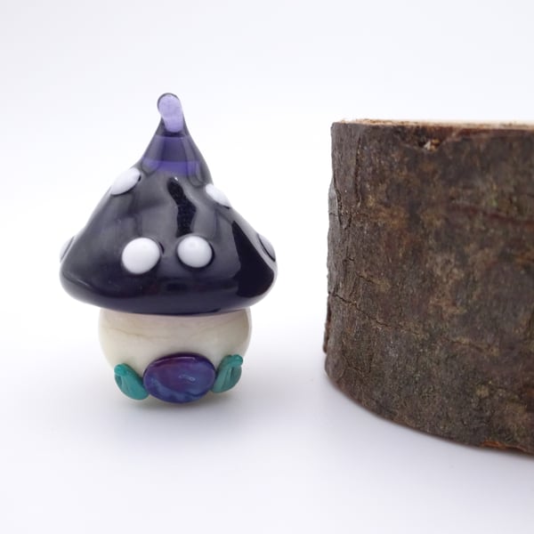small glass toadstool house