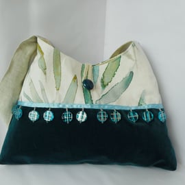 Recycled furnishing fabric shoulder bag in cream and teal