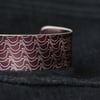 Geometric bird pattern cuff bracelet plum