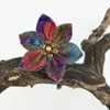 Multicoloured felt flower brooch with pearl centre