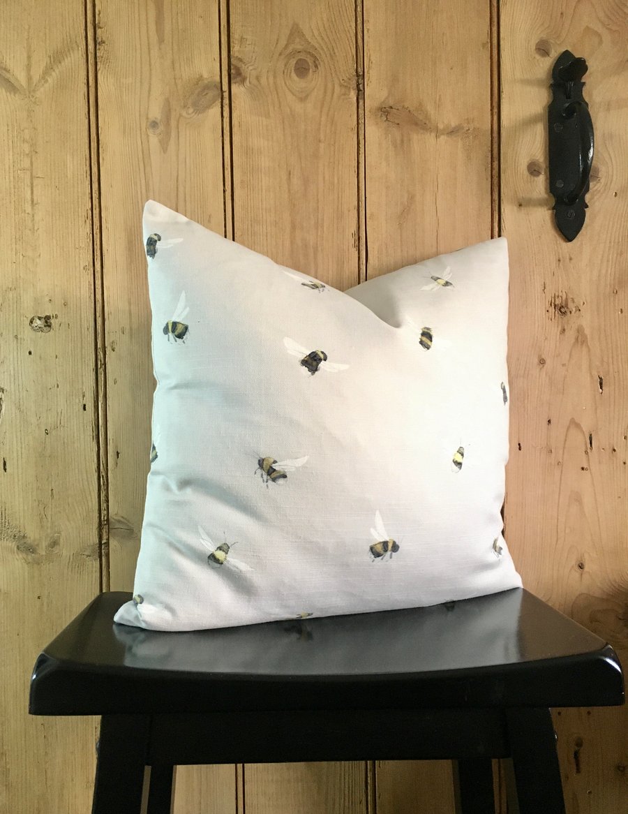 Dove grey linen cushion cover with bumble bees