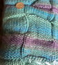 Beautiful baby blanket handknitted in Hayfield Spirit chunky